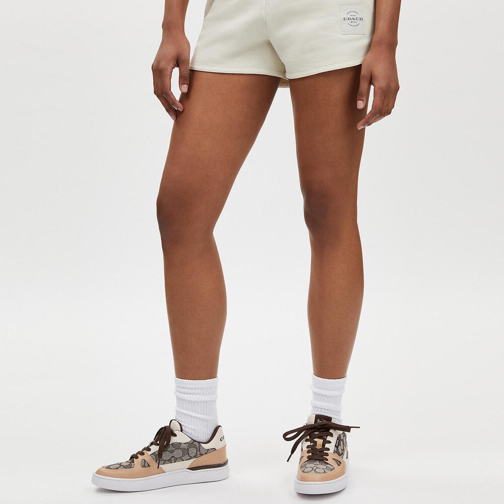 Clip Low Top Sneaker In Signature Jacquard